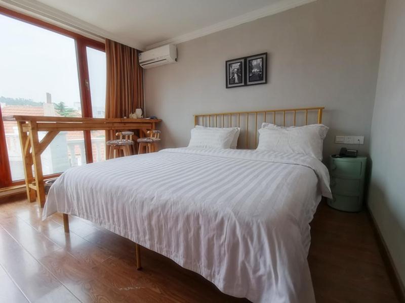 Ou Lu Business Hotel Qingdao Exterior foto